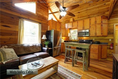 Nestled along the serene Elk River, Lazy K offers a rare - photo 32