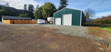 2023-built home set on nearly an acre of level, usable land - photo 32