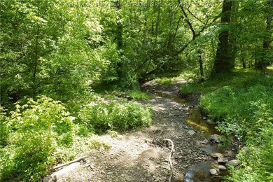 Nestled along the serene Elk River, Lazy K offers a rare - photo 33