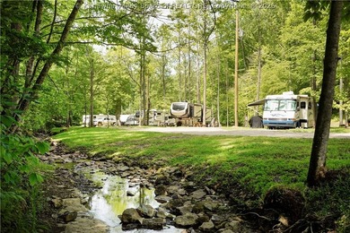 Nestled along the serene Elk River, Lazy K offers a rare - photo 35