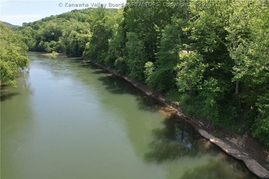 Nestled along the serene Elk River, Lazy K offers a rare - photo 40