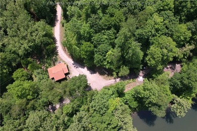 Nestled along the serene Elk River, Lazy K offers a rare - photo 48