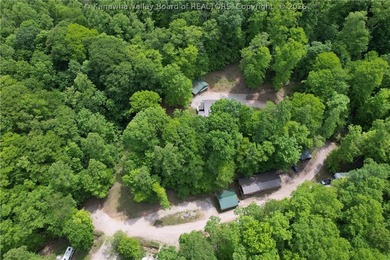 Nestled along the serene Elk River, Lazy K offers a rare - photo 49