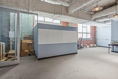 Fantastic value opportunity to own a 2nd floor business condo at