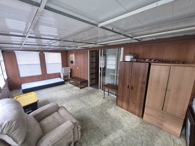 PRICED TO SELL FAST - SPACIOUS 1970 MOBILE HOME WITH FLORIDA - photo 9