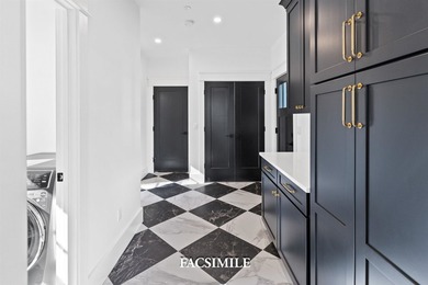 Experience life at the lake with this exquisite custom-built - photo 12