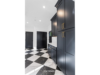 Experience life at the lake with this exquisite custom-built - photo 13