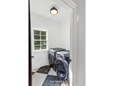Experience life at the lake with this exquisite custom-built - photo 15