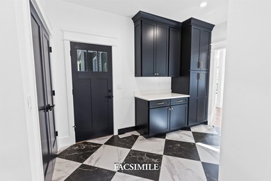 Experience life at the lake with this exquisite custom-built - photo 16