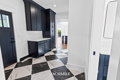 Experience life at the lake with this exquisite custom-built - photo 17