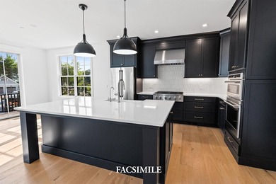 Experience life at the lake with this exquisite custom-built - photo 21