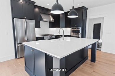 Experience life at the lake with this exquisite custom-built - photo 22