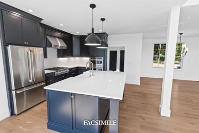 Experience life at the lake with this exquisite custom-built - photo 23