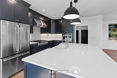 Experience life at the lake with this exquisite custom-built - photo 24