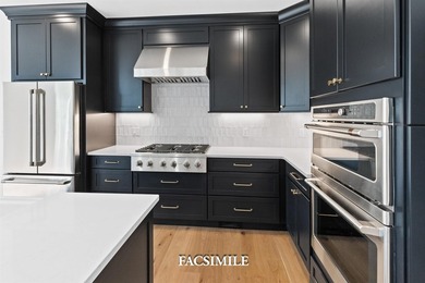Experience life at the lake with this exquisite custom-built - photo 25
