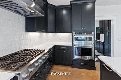 Experience life at the lake with this exquisite custom-built - photo 27