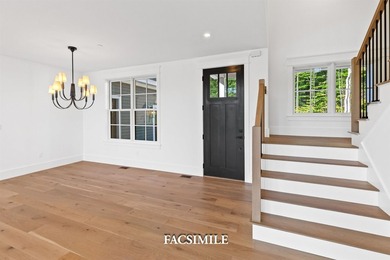 Experience life at the lake with this exquisite custom-built - photo 31