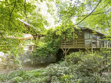 Tucked away on more than 3.8 private acres above Laurel Ridge - photo 32