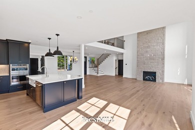 Experience life at the lake with this exquisite custom-built - photo 35