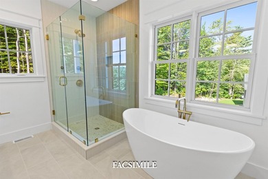 Experience life at the lake with this exquisite custom-built - photo 37
