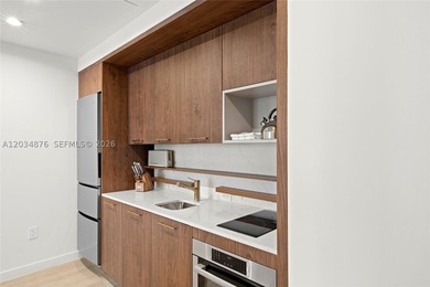 Unit 816 at Domus Brickell Park is a rare high-floor corner - photo 3