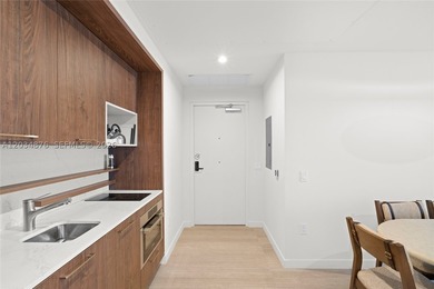 Unit 816 at Domus Brickell Park is a rare high-floor corner - photo 8