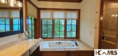 NEW LISTING! Voluminous views and privacy from this LIKE NEW - photo 31