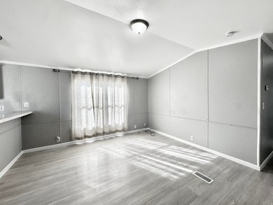 Move-in ready mobile home featuring 3 bedrooms and 2 bathrooms - photo 2