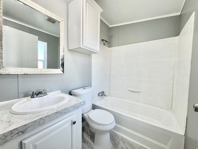 Move-in ready mobile home featuring 3 bedrooms and 2 bathrooms - photo 8