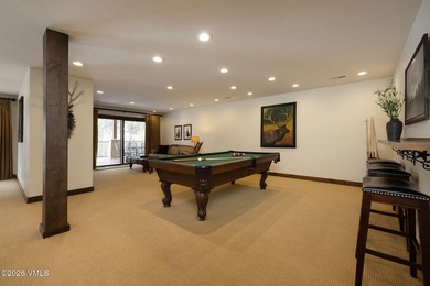 Strategically positioned along the banks of Gore Creek, this - photo 23