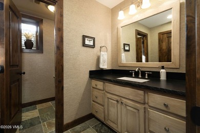 Strategically positioned along the banks of Gore Creek, this - photo 31