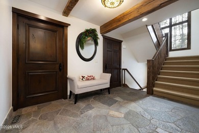Strategically positioned along the banks of Gore Creek, this - photo 32