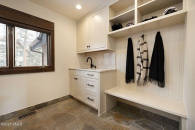 Strategically positioned along the banks of Gore Creek, this - photo 33