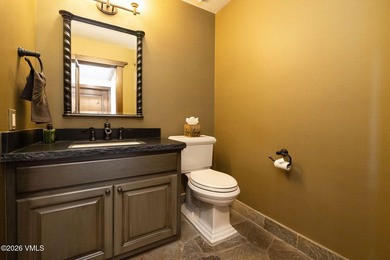 Strategically positioned along the banks of Gore Creek, this - photo 35