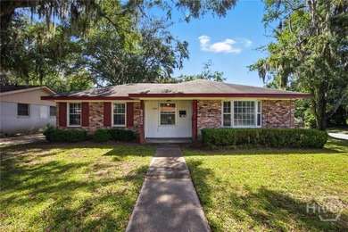 Three bedroom, brick ranch, centrally located on fully fenced - photo 1