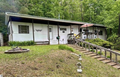 Lake Home For Sale in Mancelona, Michigan