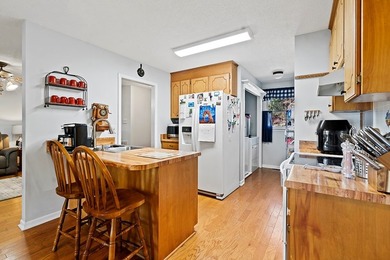 Discover easy lake living in this beautifully maintained - photo 3