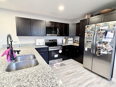Welcome home! This almost New, Single Story home has an open - photo 3