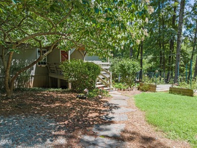 Welcome to a one-of-a-kind retreat nestled on 5.19 acres just