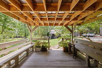 Welcome to a one-of-a-kind retreat nestled on 5.19 acres just