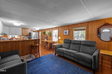 Welcome to a one-of-a-kind retreat nestled on 5.19 acres just