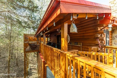 This charming 3-bedroom, 3-bathroom log cabin offers 1,310 sq ft - photo 2
