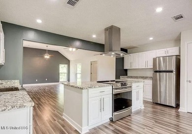 Welcome to 6535 Lakeshore Drive, where comfort and location come - photo 2