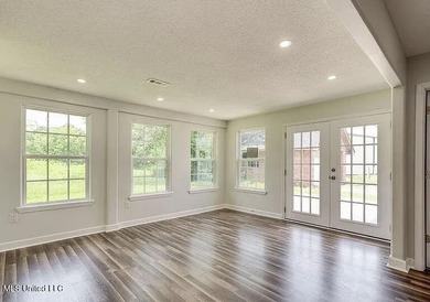 Welcome to 6535 Lakeshore Drive, where comfort and location come - photo 3