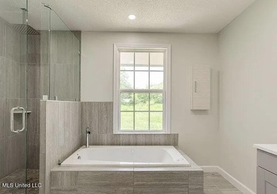 Welcome to 6535 Lakeshore Drive, where comfort and location come - photo 6