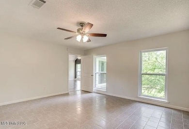 Welcome to 6535 Lakeshore Drive, where comfort and location come - photo 7