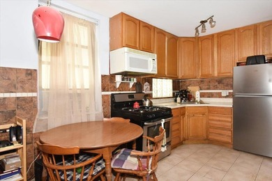 Nestled in the vibrant heart of Astoria, this stunning 1-bedroom - photo 7