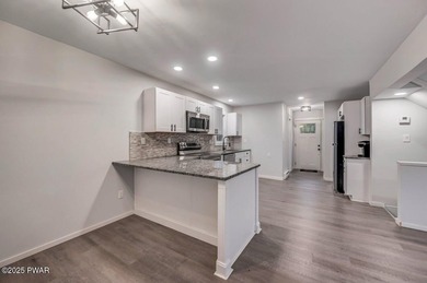 Embrace captivating views of the golf course from this remodeled - photo 11