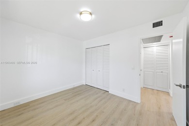 Stunning Lake & Golf Course Views. Fully Renovated Condo in