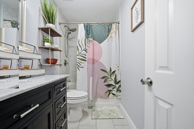 Step into this gorgeous, fully furnished townhome where coastal - photo 14